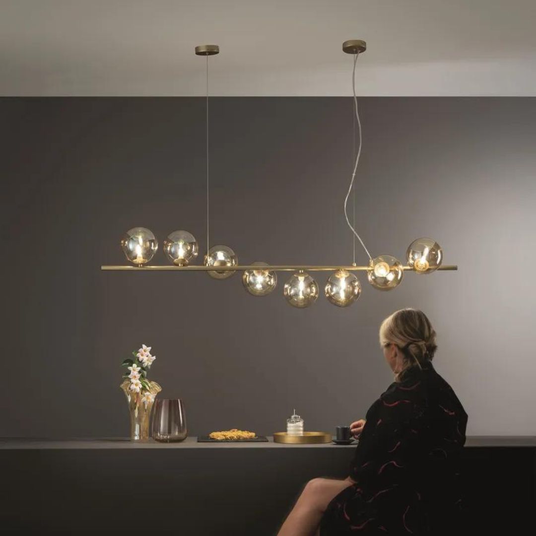 Sospensione lineare 8 luci in metallo e sfere in vetro, due colori oro o nero art. HONEY-S8