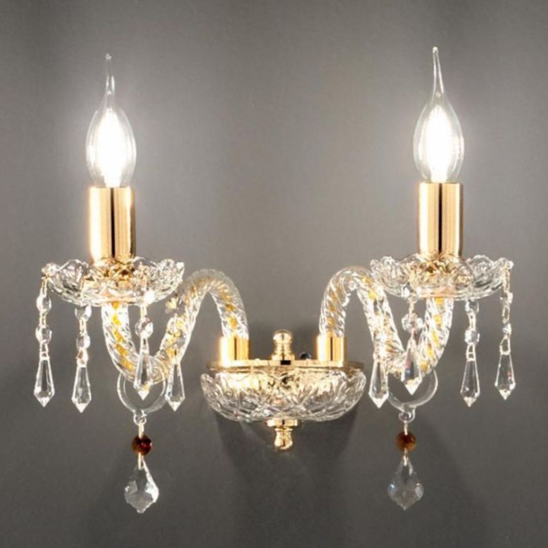 Applique in cristallo trasparente con parti metalli che oro o cromo ad una o due luci art DALLAS AP1 - AP2